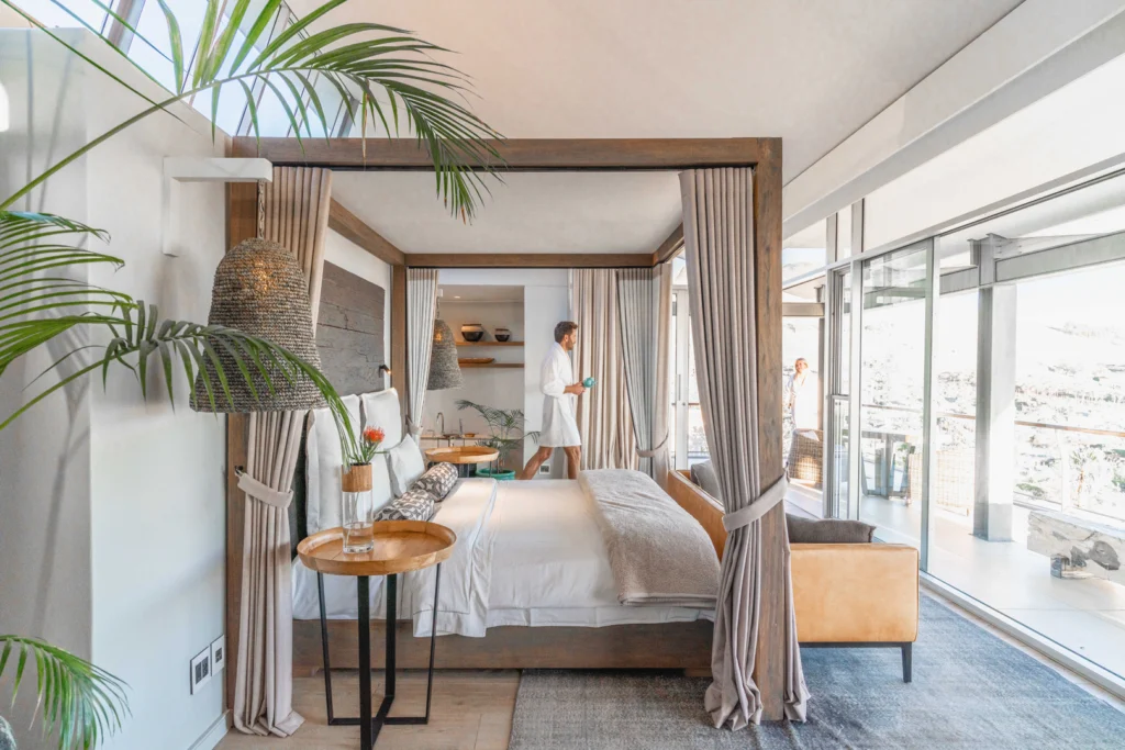 Atzaró Cape Town's Lion's Head suite featuring a four poster bed and elegant interiors