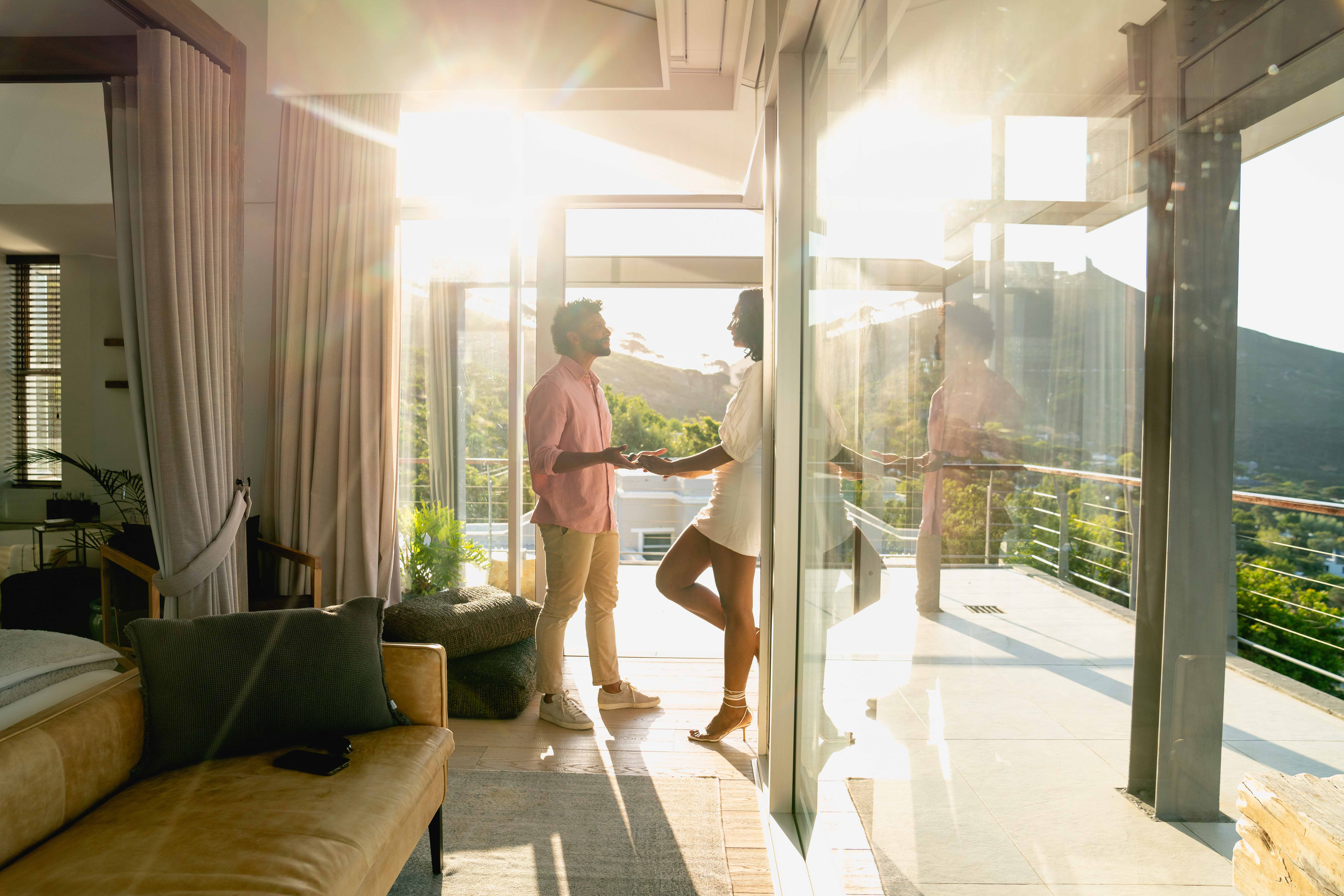 A couple in Lion's Head Suite in the Atzaró Cape Town Small Boutique Hotel.