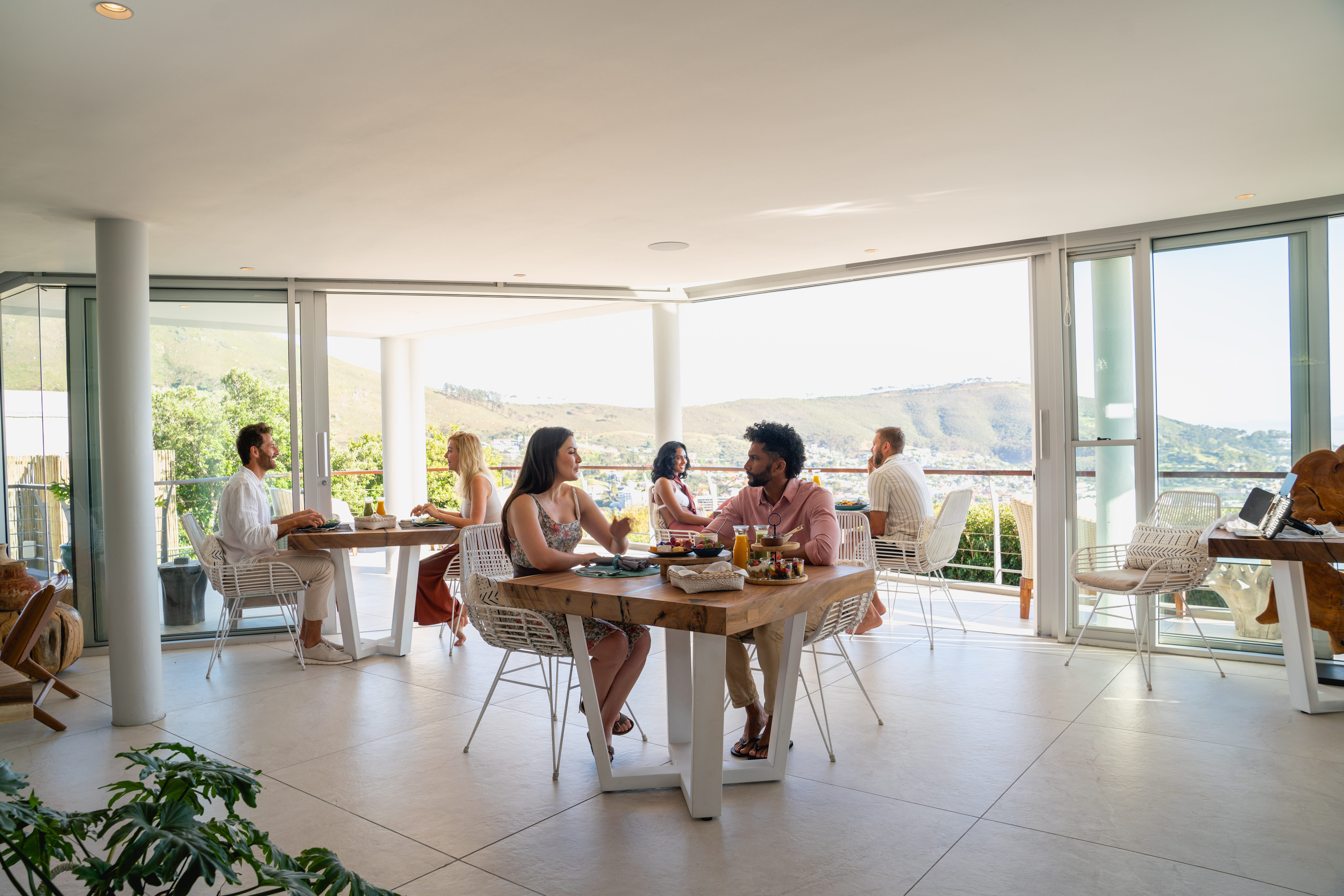 Family group taking breakfast in Atzaró Cape Town