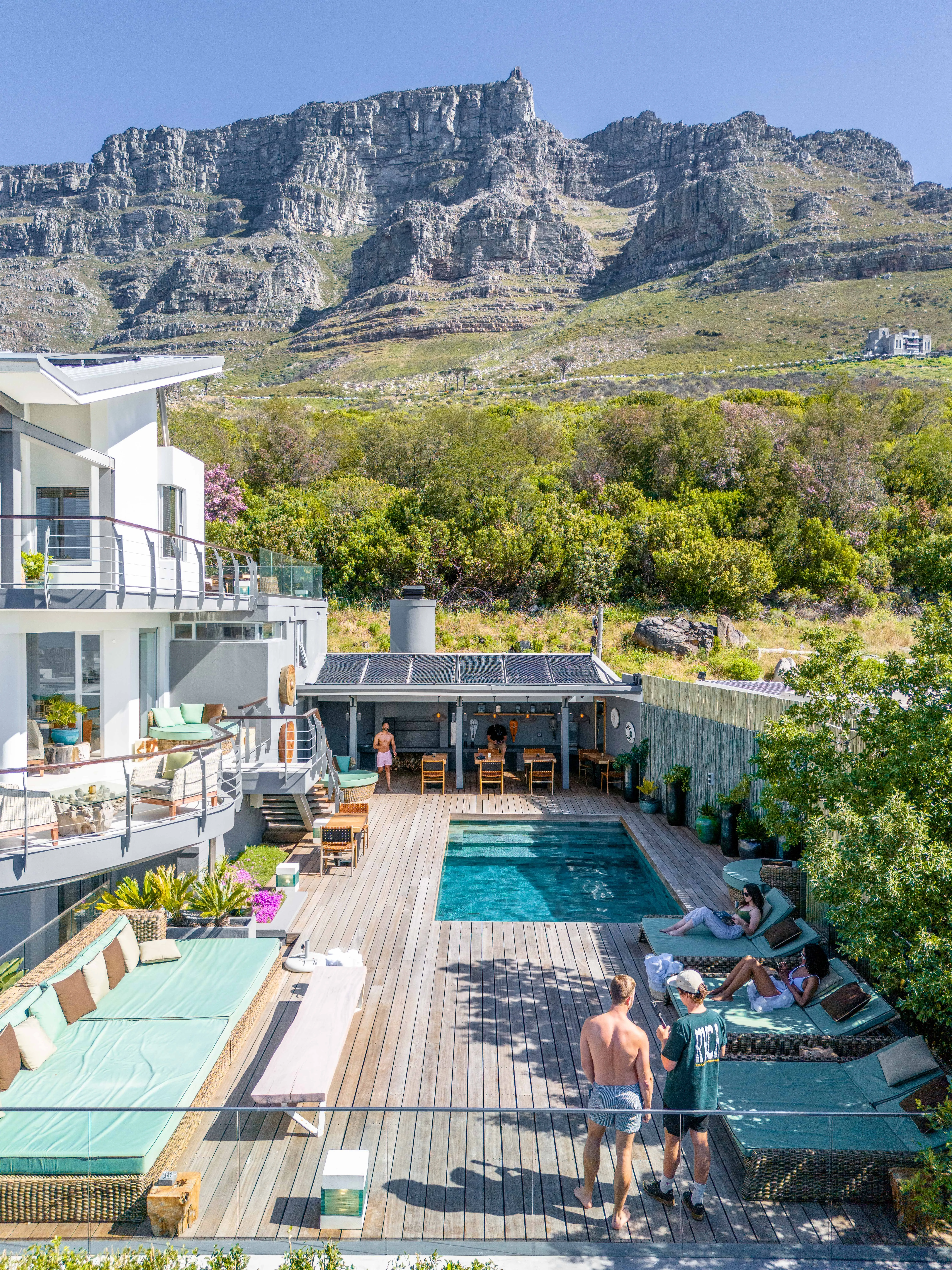 Family group in the pool area in Atzaró Cape Town